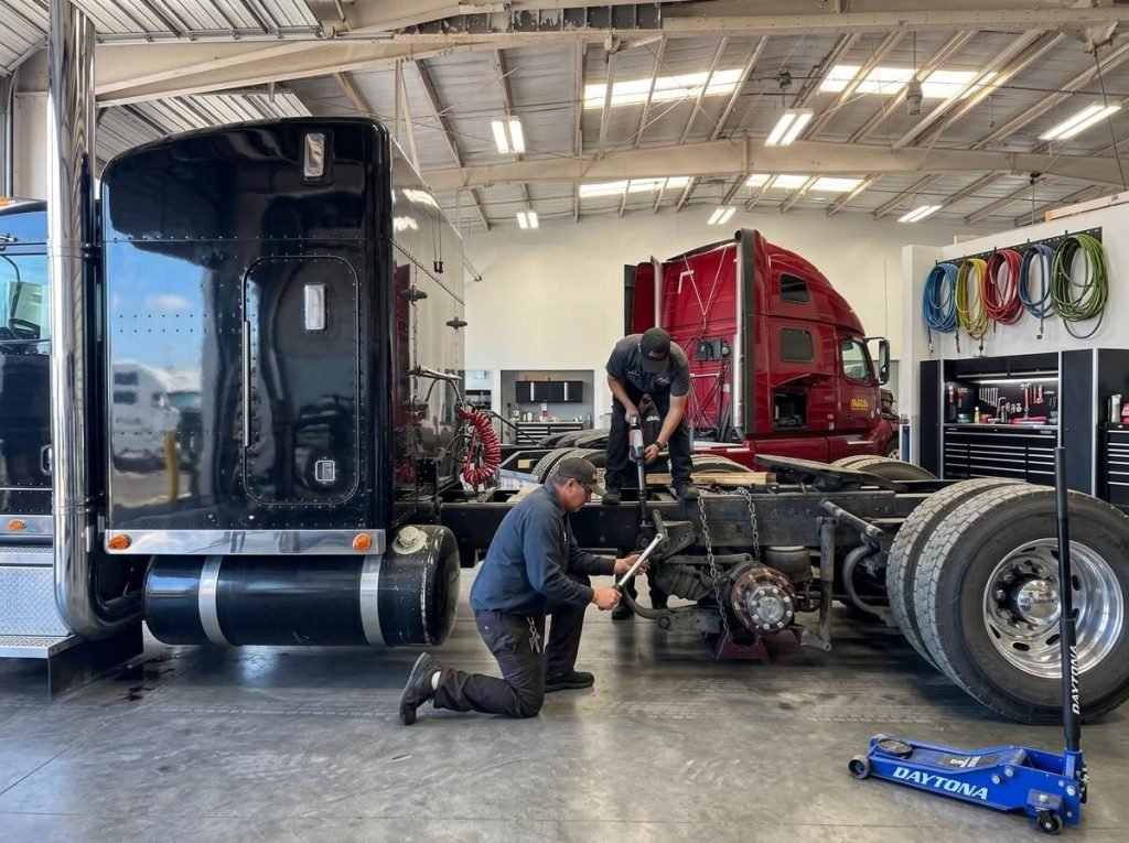 Bawa’s technician repairing a heavy-duty truck in the Dallas shop